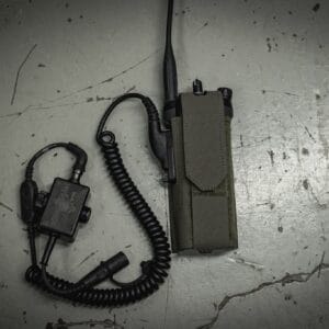 Motorola APX 6000/7000/8000 Radio Pouch: Snug fit for handheld two-way radio with coiled cord. Positioned on worn